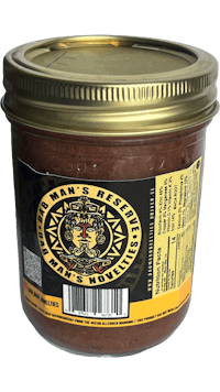 a jar of chocolate sauce with a label on it