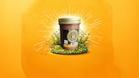 a jar of chutney on an orange background